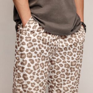 Comfortable Unisex Track Pants in Bold Animal Print Step out in comfortable unisex track pants in bold animal print. Enjoy fashion-forward comfort and eye-catching style—order your pair today!